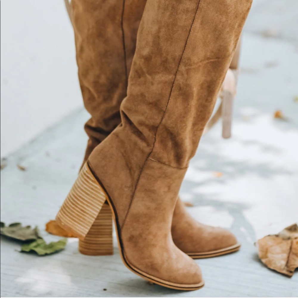 Never worn, knee high boot